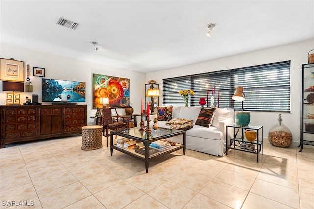 5631 Shaddelee Ln W, Fort Myers, FL 33919 - living area with tile patterned flooring