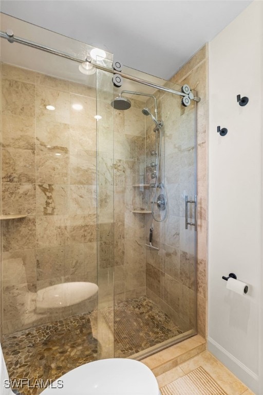 5631 Shaddelee Ln W, Fort Myers, FL 33919 - bathroom with a stall shower and tile patterned floors