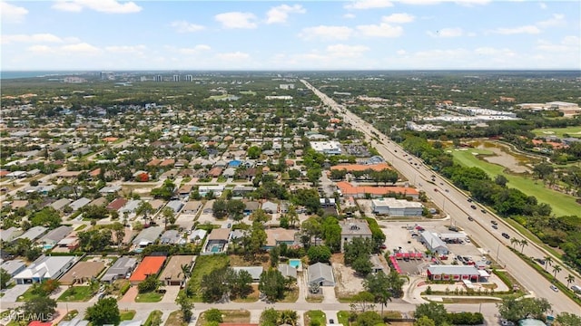 860 102nd Ave N, Naples, FL 34108 - aerial overview of property's location featuring nearby suburban area and a nearby body of water