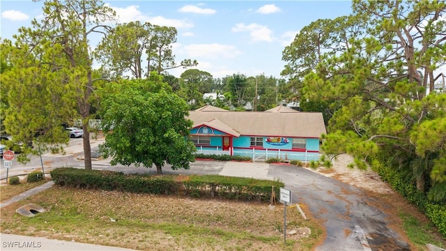 860 102nd Ave N, Naples, FL 34108 - view of front of home featuring driveway