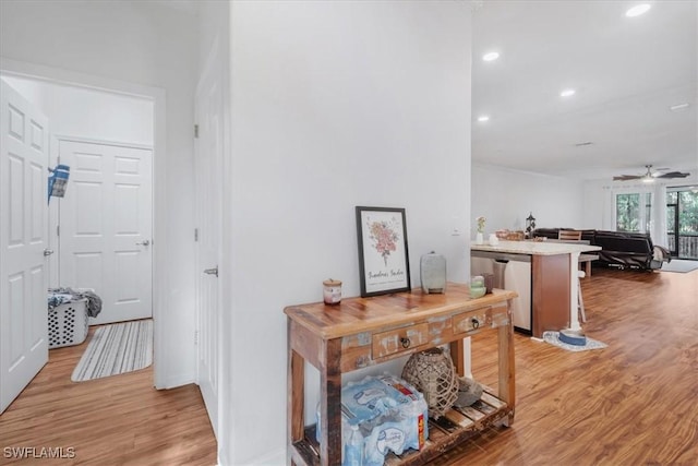 9052 Glenforest Dr, Naples, FL 34120 - hallway with light wood finished floors, recessed lighting, and baseboards