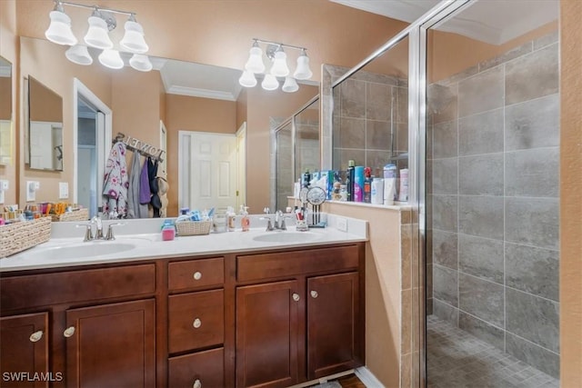 9052 Glenforest Dr, Naples, FL 34120 - bathroom with ornamental molding, a shower stall, and double vanity
