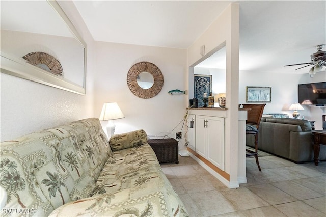 5483 Peppertree Dr Unit 1, Fort Myers, FL 33908 - living area featuring a ceiling fan and light tile patterned flooring