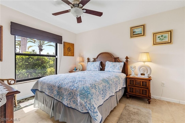 5483 Peppertree Dr Unit 1, Fort Myers, FL 33908 - bedroom featuring baseboards, light tile patterned floors, and ceiling fan