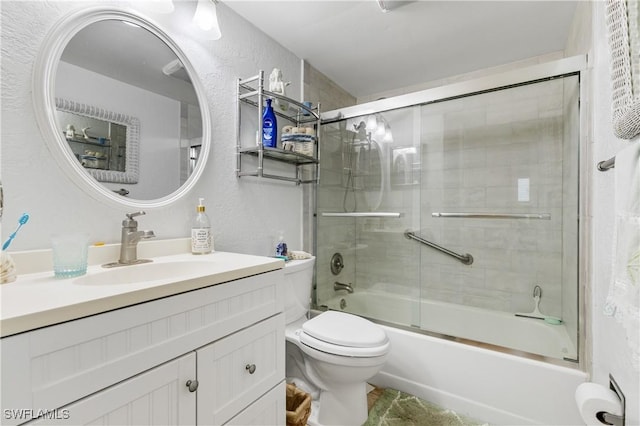 5483 Peppertree Dr Unit 1, Fort Myers, FL 33908 - bathroom with a textured wall, vanity, toilet, and enclosed tub / shower combo