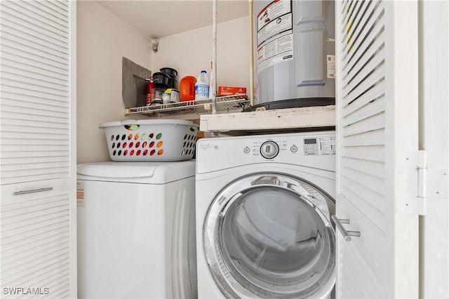 5483 Peppertree Dr Unit 1, Fort Myers, FL 33908 - laundry area with washing machine and clothes dryer and electric water heater
