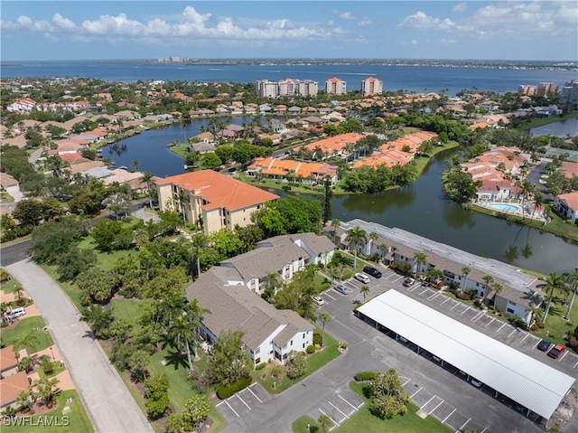 5483 Peppertree Dr Unit 1, Fort Myers, FL 33908 - aerial perspective of suburban area with a nearby body of water