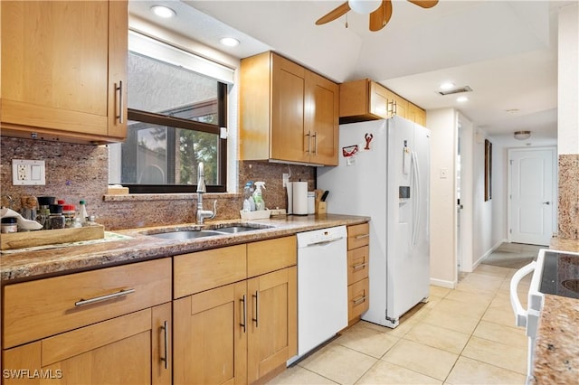 5483 Peppertree Dr Unit 1, Fort Myers, FL 33908 - kitchen with white appliances, a ceiling fan, a sink, tasteful backsplash, and light tile patterned floors