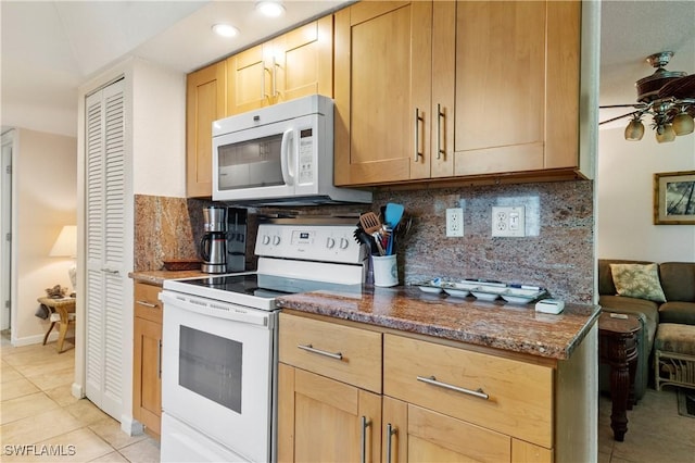 5483 Peppertree Dr Unit 1, Fort Myers, FL 33908 - kitchen with white appliances, light tile patterned flooring, light brown cabinets, a ceiling fan, and recessed lighting