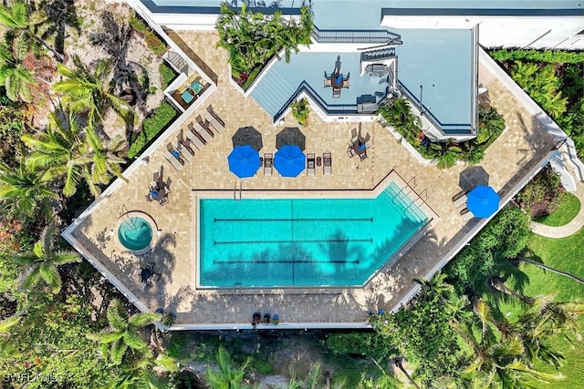 6001 Pelican Bay Blvd Unit 1405, Naples, FL 34108 - view from above of property featuring a pool