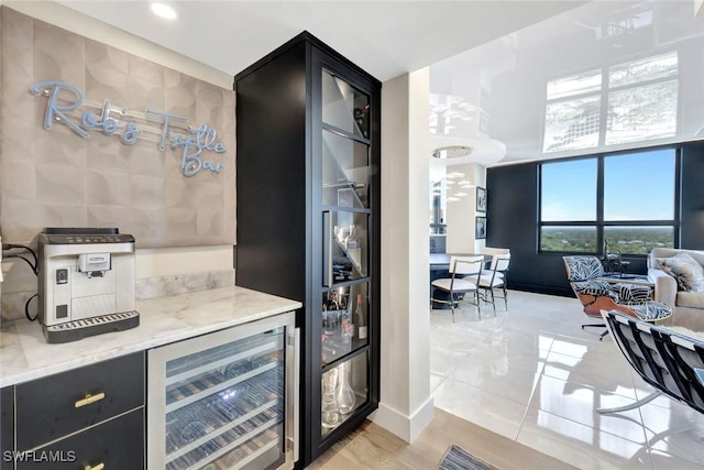 6001 Pelican Bay Blvd Unit 1405, Naples, FL 34108 - indoor dry bar with wine cooler, baseboards, refrigerator, and recessed lighting