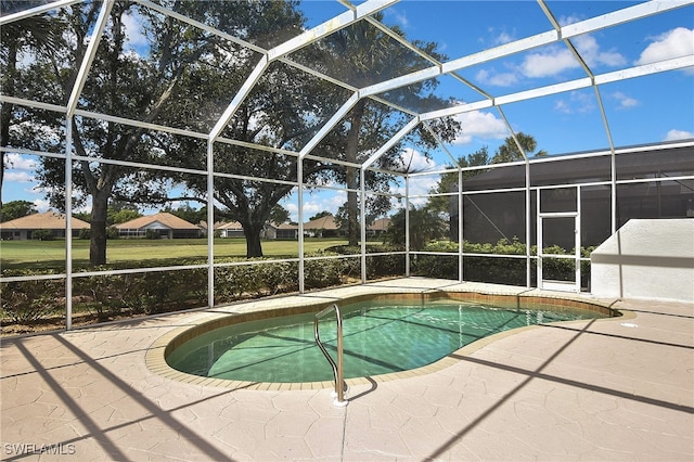 19741 Vintage Trace Cir, Estero, FL 33967 - swimming pool with a patio and a lanai