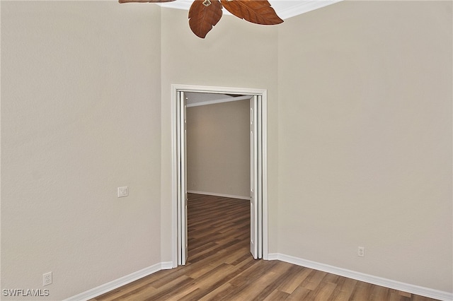 19741 Vintage Trace Cir, Estero, FL 33967 - spare room featuring a ceiling fan, wood finished floors, crown molding, and baseboards