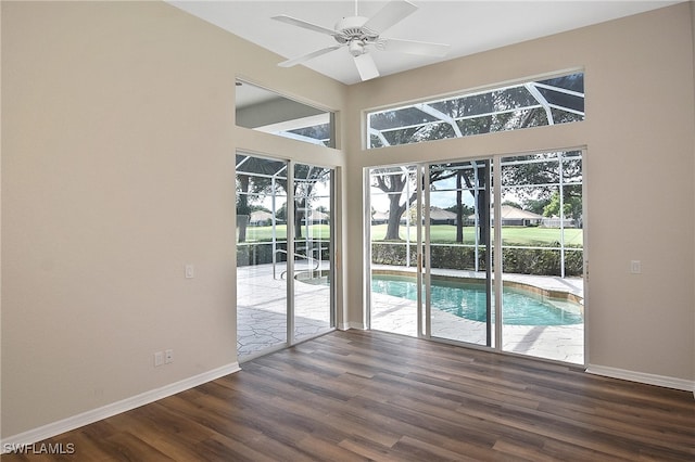 19741 Vintage Trace Cir, Estero, FL 33967 - unfurnished room with wood finished floors, baseboards, and ceiling fan