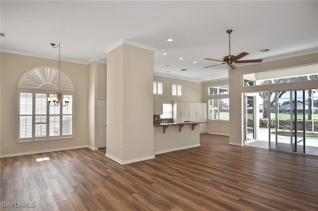 19741 Vintage Trace Cir, Estero, FL 33967 - unfurnished living room featuring ceiling fan, ornamental molding, dark wood finished floors, recessed lighting, and baseboards