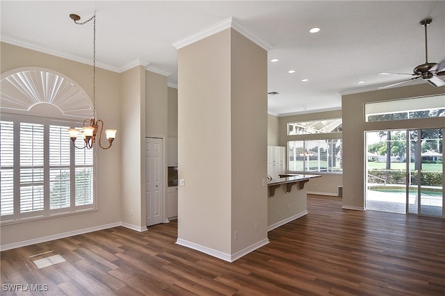 19741 Vintage Trace Cir, Estero, FL 33967 - unfurnished room with crown molding, dark wood-style floors, a ceiling fan, baseboards, and recessed lighting