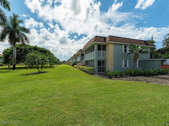 1400 Pompei Ln Unit 2, Naples, FL 34103 - view of community featuring a yard
