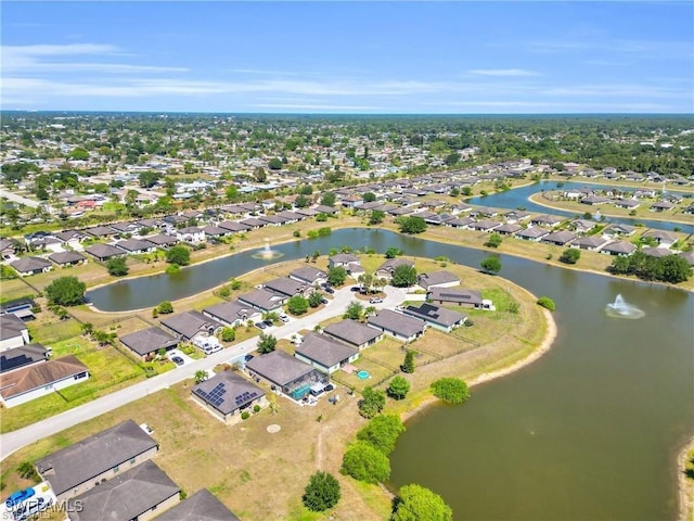 154 Shadowview Ct, Lehigh Acres, FL 33974 - aerial view of property's location with nearby suburban area and a nearby body of water