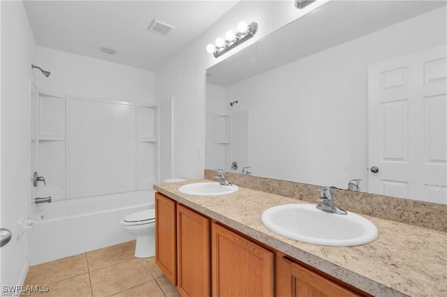 154 Shadowview Ct, Lehigh Acres, FL 33974 - bathroom with double vanity, toilet, washtub / shower combination, and tile patterned flooring