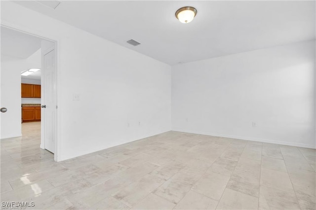 154 Shadowview Ct, Lehigh Acres, FL 33974 - empty room with arched walkways