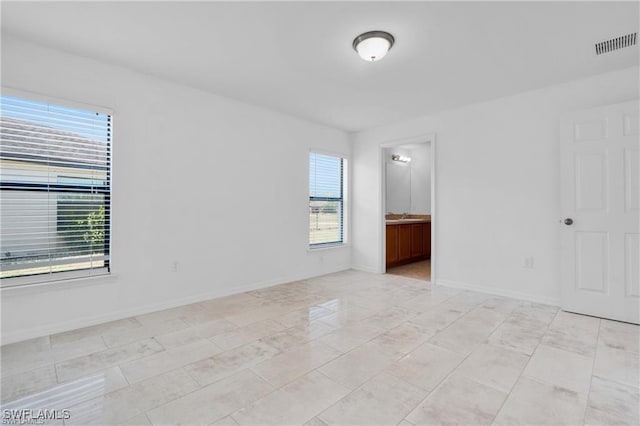 154 Shadowview Ct, Lehigh Acres, FL 33974 - empty room with baseboards