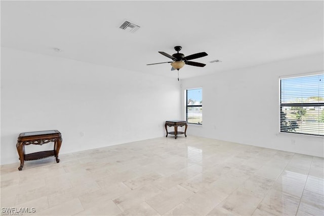 154 Shadowview Ct, Lehigh Acres, FL 33974 - unfurnished room with a ceiling fan