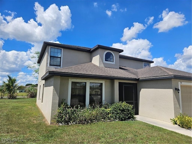 154 Shadowview Ct, Lehigh Acres, FL 33974 - view of front of house featuring stucco siding, an attached garage, a front lawn, and roof with shingles