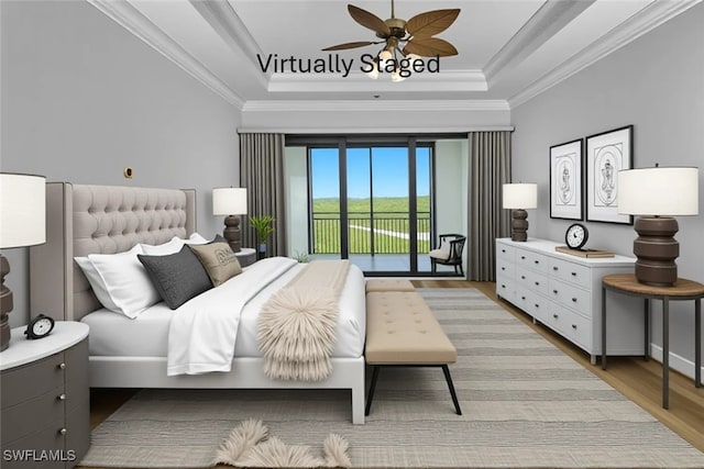 4771 Via Del Corso Ln Unit 302, Bonita Springs, FL 34134 - bedroom with access to exterior, a raised ceiling, light wood-type flooring, and ornamental molding