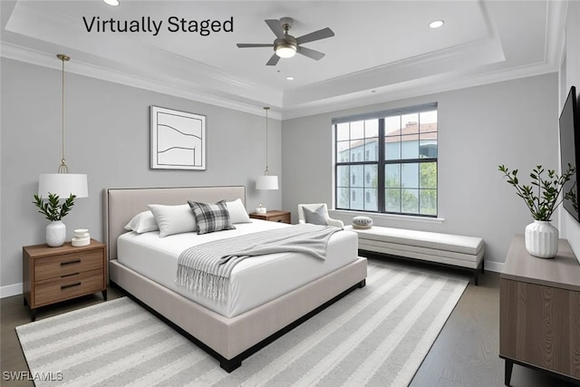 4771 Via Del Corso Ln Unit 302, Bonita Springs, FL 34134 - bedroom with a tray ceiling, recessed lighting, baseboards, wood finished floors, and ornamental molding