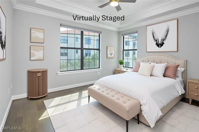 4771 Via Del Corso Ln Unit 302, Bonita Springs, FL 34134 - bedroom with a tray ceiling, ornamental molding, baseboards, ceiling fan, and wood finished floors
