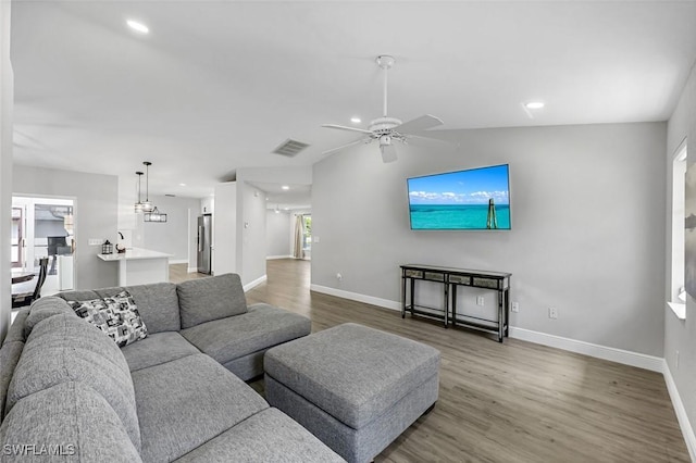 10268 Boca Cir, Naples, FL 34109 - living area with wood finished floors, baseboards, a ceiling fan, and recessed lighting