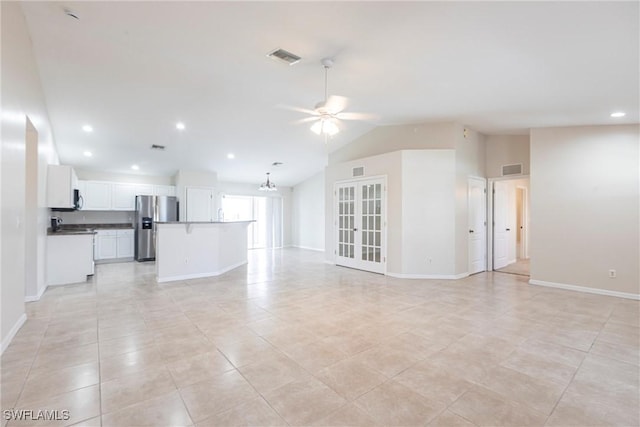 2121 NW 18th Pl, Cape Coral, FL 33993 - unfurnished living room with ceiling fan, baseboards, light tile patterned floors, lofted ceiling, and recessed lighting