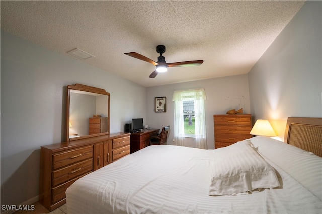4 Desert Candle Cir, Lehigh Acres, FL 33936 - bedroom featuring a textured ceiling and ceiling fan