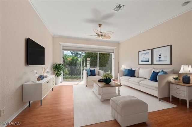 1435 Vintage Ln, Naples, FL 34104 - living room with crown molding, light wood-style flooring, and ceiling fan