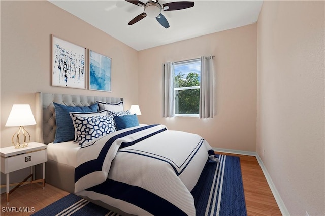 1435 Vintage Ln, Naples, FL 34104 - bedroom featuring wood finished floors and ceiling fan