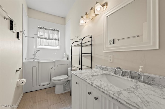 1435 Vintage Ln, Naples, FL 34104 - bathroom featuring a bath and vanity