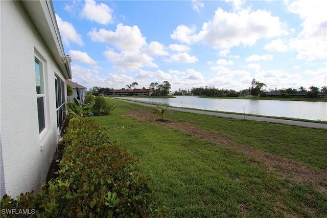 25561 Fairway Dunes Ct, Bonita Springs, FL 34135 - view of grassy yard featuring a water view