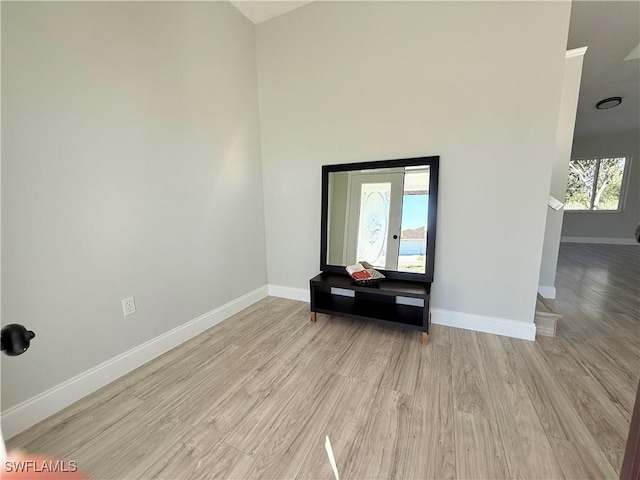 1438 Navigator Rd, Punta Gorda, FL 33983 - empty room with baseboards and light wood-style floors