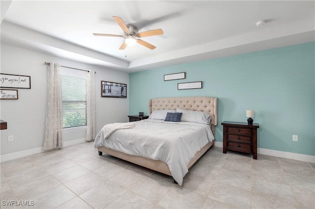 14121 Roof St, Fort Myers, FL 33905 - bedroom featuring baseboards, a raised ceiling, light tile patterned flooring, and a ceiling fan