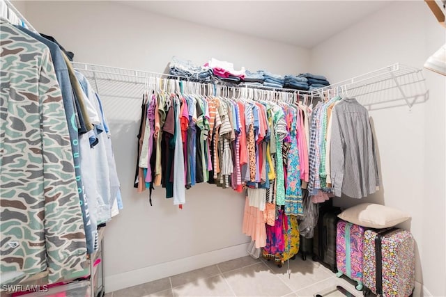 14121 Roof St, Fort Myers, FL 33905 - spacious closet featuring tile patterned flooring