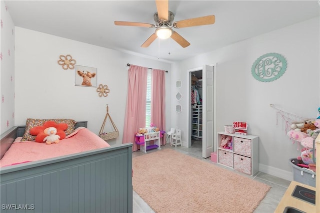 14121 Roof St, Fort Myers, FL 33905 - bedroom featuring ceiling fan, baseboards, a closet, and a walk in closet
