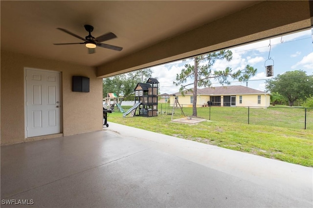 14121 Roof St, Fort Myers, FL 33905 - view of patio featuring a playground and ceiling fan