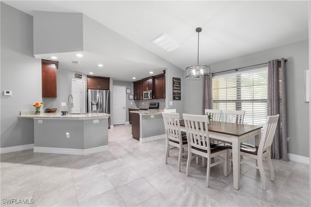 14121 Roof St, Fort Myers, FL 33905 - dining space with vaulted ceiling, baseboards, a chandelier, and recessed lighting