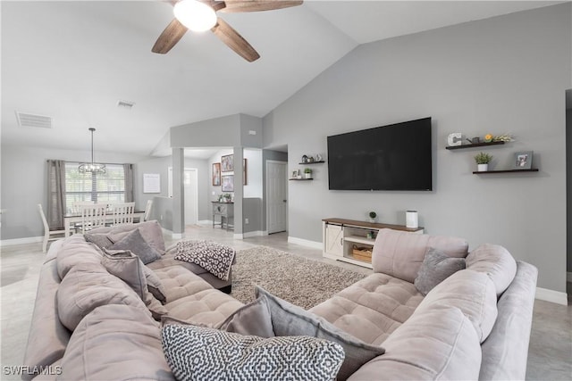 14121 Roof St, Fort Myers, FL 33905 - living room with a ceiling fan, lofted ceiling, baseboards, and a chandelier