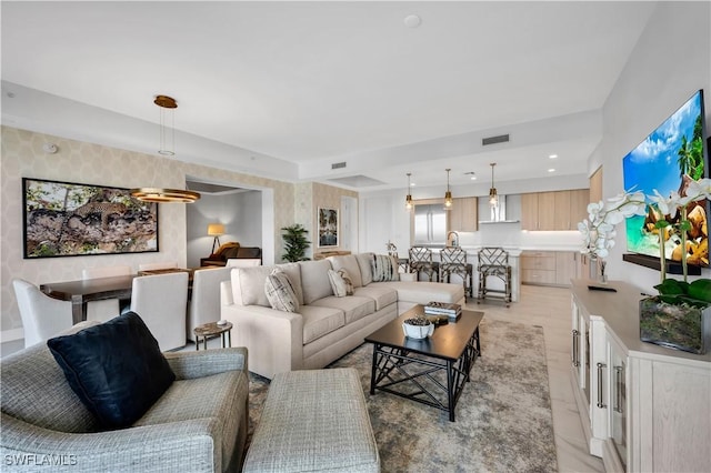 1115 Central Ave Unit 547, Naples, FL 34102 - living room with recessed lighting and light tile patterned floors