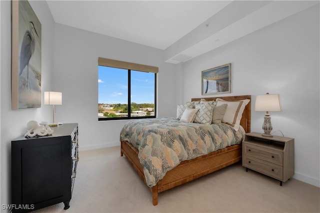 1115 Central Ave Unit 547, Naples, FL 34102 - bedroom featuring light colored carpet and baseboards