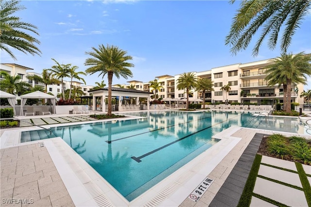 1115 Central Ave Unit 547, Naples, FL 34102 - community pool with a gazebo and a patio