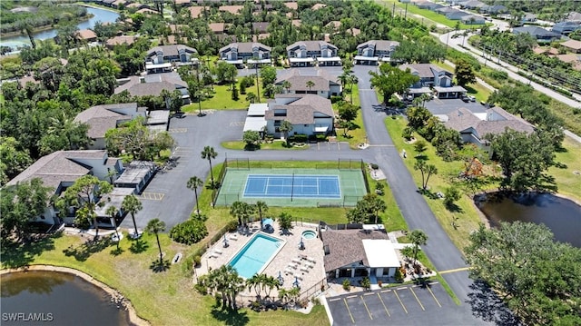 17451 Overhill Dr Unit F, Fort Myers, FL 33908 - aerial overview of property's location featuring a pool area, a nearby body of water, and nearby suburban area