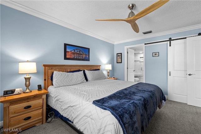 17451 Overhill Dr Unit F, Fort Myers, FL 33908 - carpeted bedroom featuring a barn door, crown molding, connected bathroom, a ceiling fan, and a textured ceiling