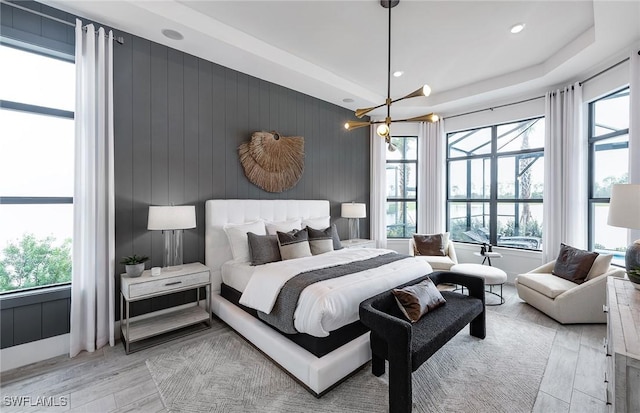 1825 Verada Ct, Naples, FL 34120 - bedroom with light wood-style floors, a chandelier, and recessed lighting